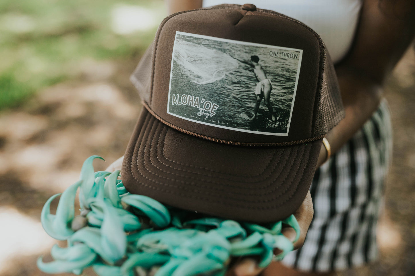 One Throw Trucker Hat—throw net
