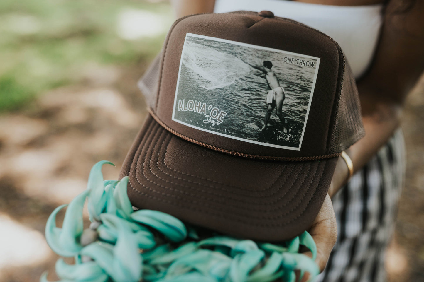 One Throw Trucker Hat—throw net