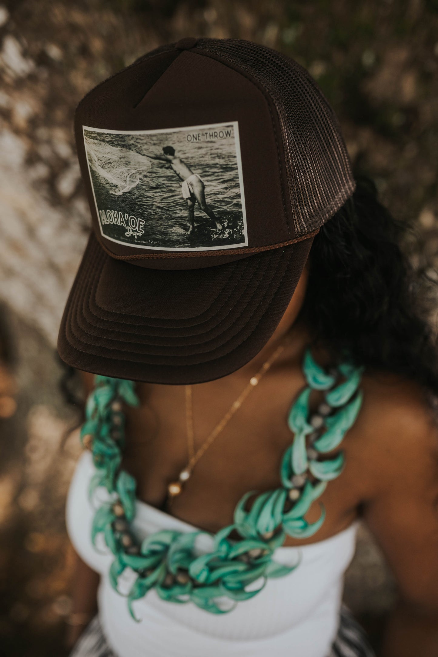 One Throw Trucker Hat—throw net
