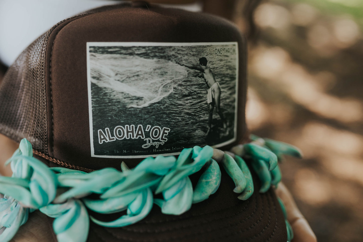 One Throw Trucker Hat—throw net