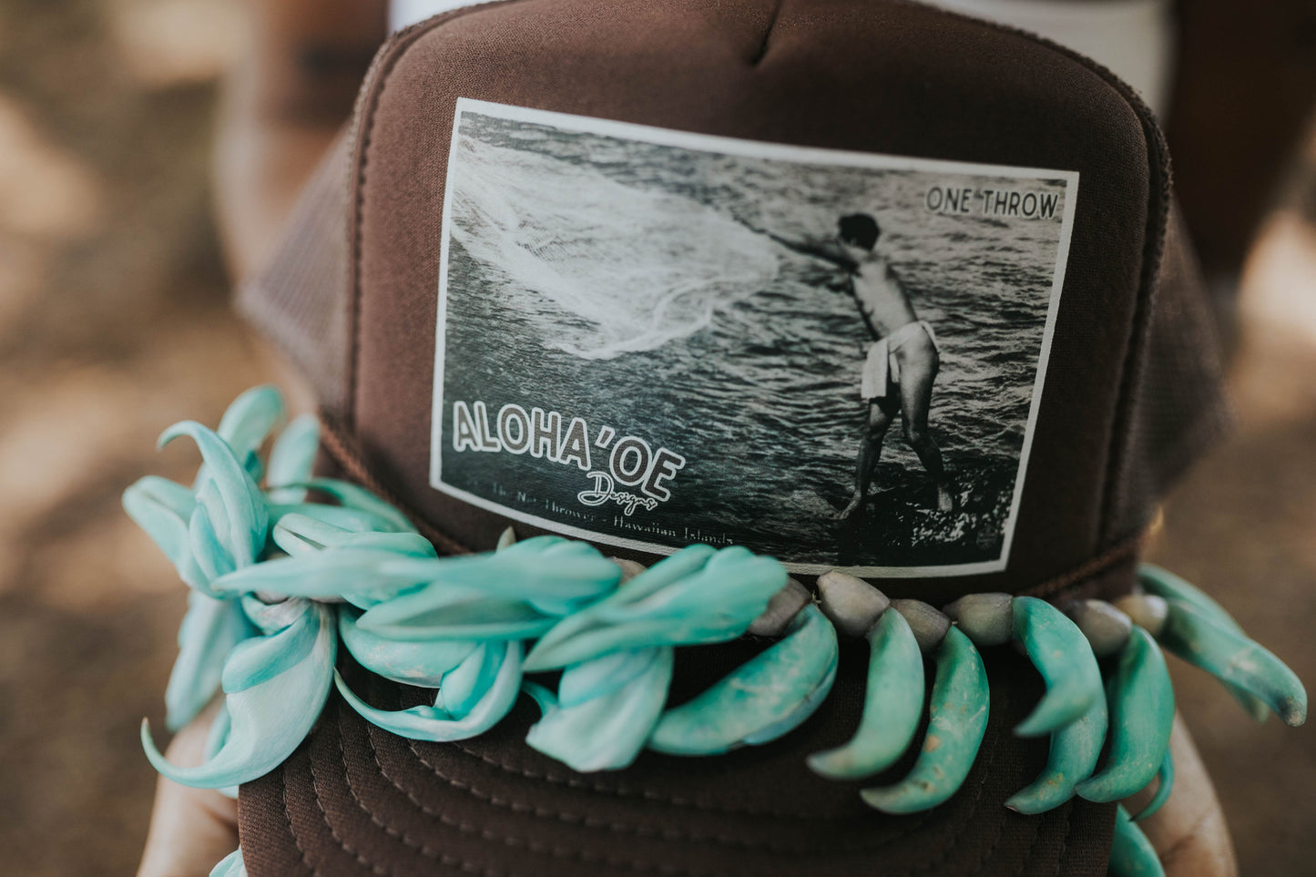One Throw Trucker Hat—throw net