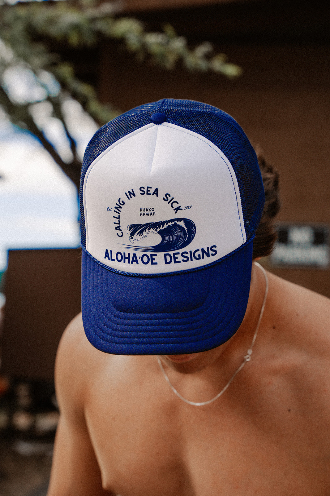 Calling in Sea Sick Trucker Hat by Aloha ‘Oe Designs